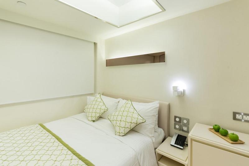 Hotel Pravo Hongkong Rum bild